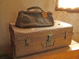 Old suitcase on display at the Pine and Pug Hut at The Village - Historic Loxton